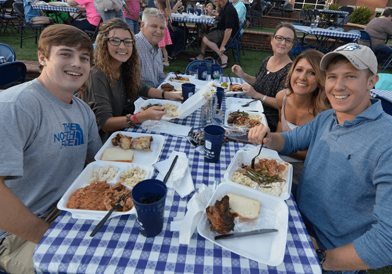 people eating barbecue