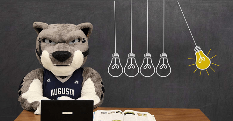 Augustus mascot beside lighbulbs