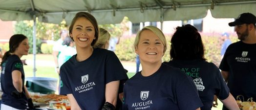 Volunteers with food