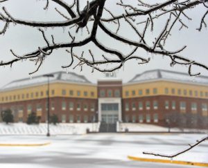 exterior of building in the winter surrounded by snow
