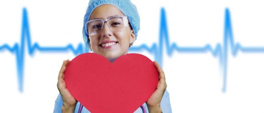 nurse holding a heart