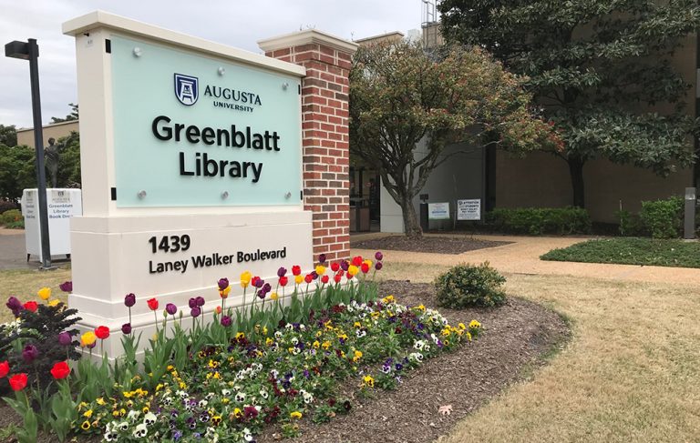 Greenblatt Library sign in front of building