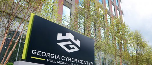 exterior of a building with a sign that says georgia cyber center