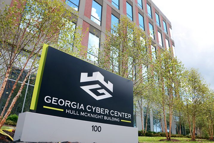 exterior of a building with a sign that says georgia cyber center