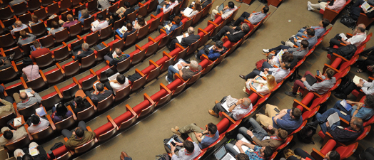 people sitting in an auditorium