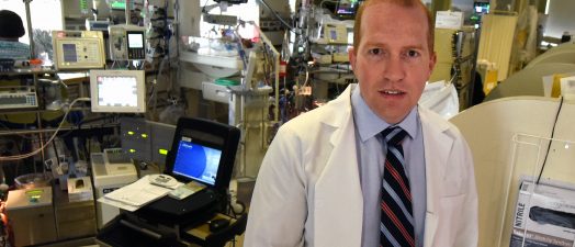 Doctor in front of medical equipment