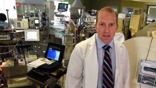 Doctor in front of medical equipment