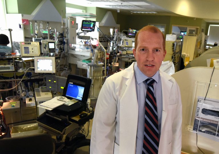 Doctor in front of medical equipment
