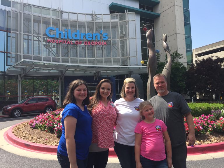 The Chafin family in front of hospital.