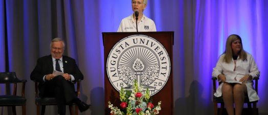 Woman at podium