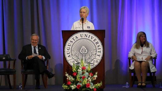 Woman at podium