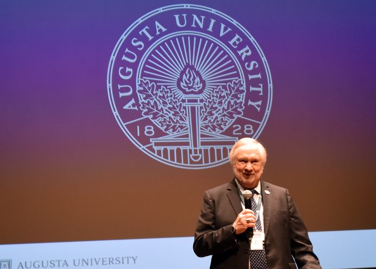 Man standing on stage.