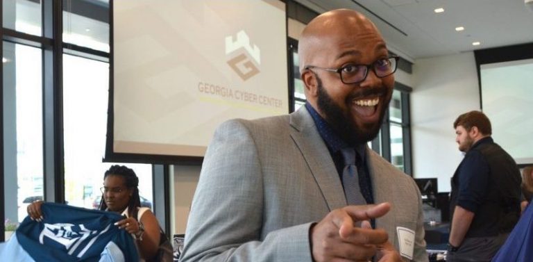 Man in a conference room.