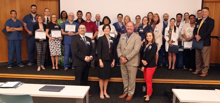 A group photo AU Health employees.