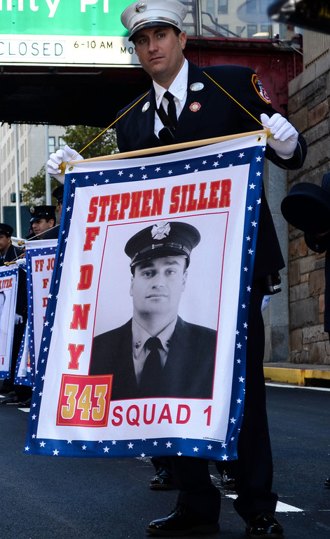 Man holding a banner.