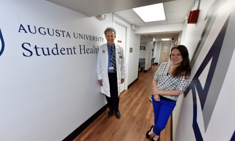 two doctors in a hallway