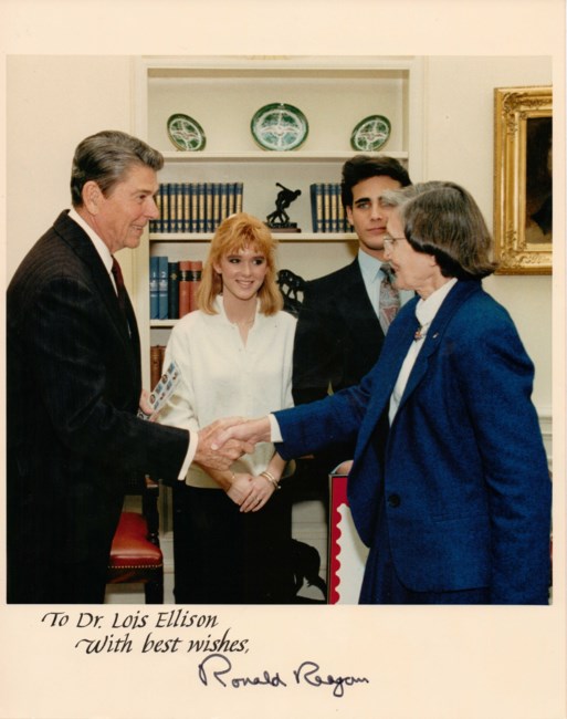 President Ronald Reagan shaking hands with Dr. Lois Ellison.