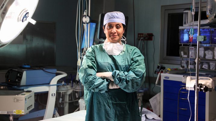 Surgeon standing in an operating room