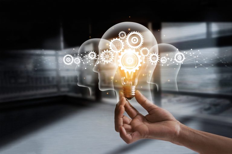 Light bulb and hand