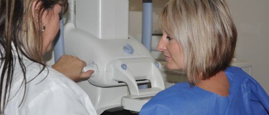 Woman getting a mammogram.
