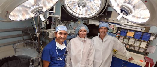 Three doctors in operating room