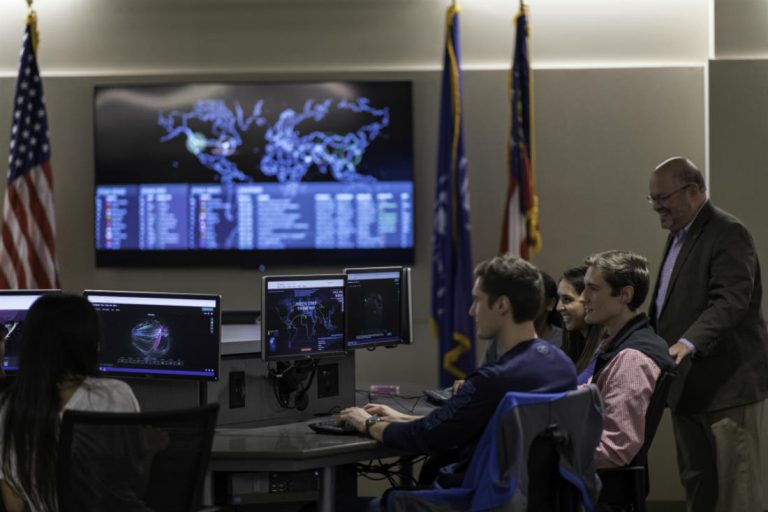 Students in the School of Computer and Cyber Sciences Cyber Lab.