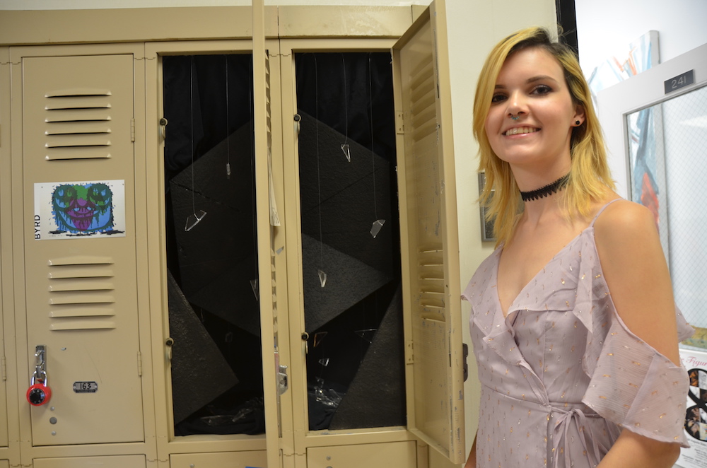 Women with her locker.