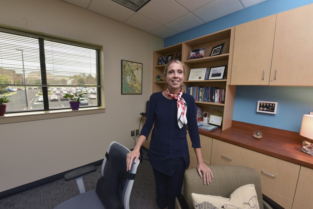 Dr. Elena Petrova pictured in her office on the Summerville Campus