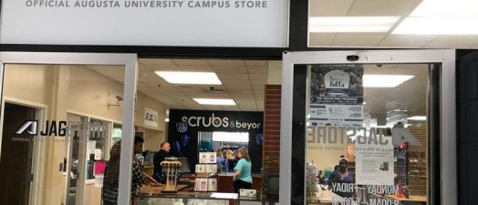 JagStore sign and glass doors entrance