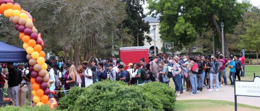 Students standing outside in line