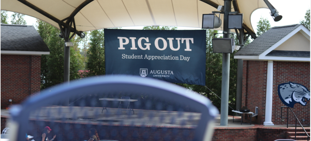 sign on a stage that says pig out
