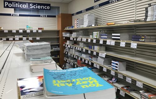 Shelves of books for business and political science college courses