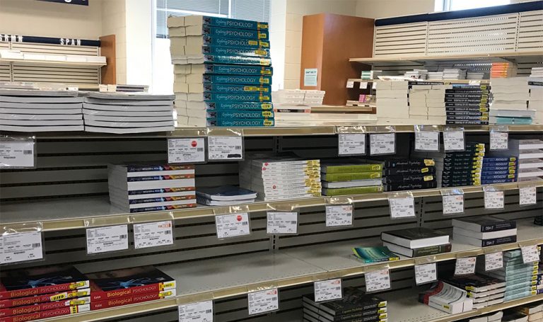 Stacks of college psychology textbooks