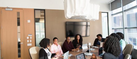 people gathering in a conference room