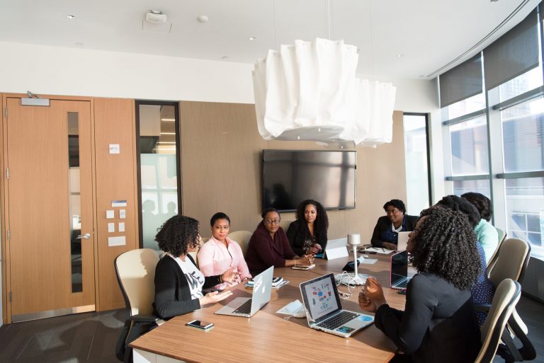 people gathering in a conference room