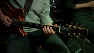 man playing guitar