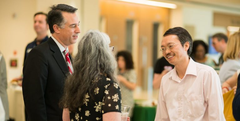 people inside a building casually talking