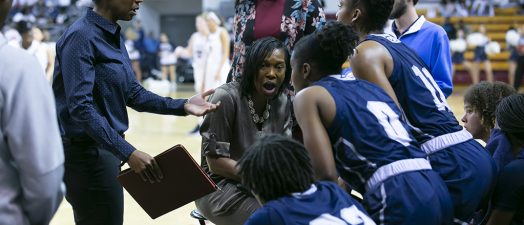 Woman talking to team
