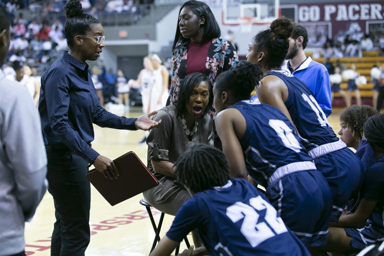 Woman talking to team