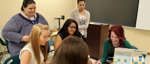 students listening to a student present