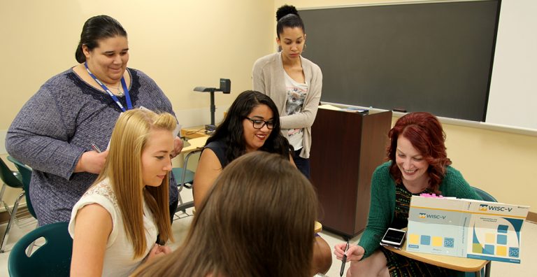 students listening to a student present