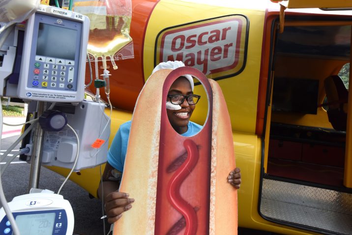 patient smiles in hot dog