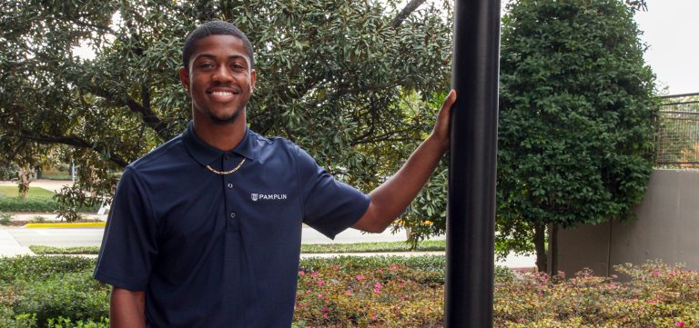 man standing outside for a photo