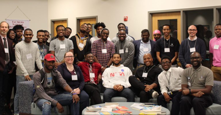A group of people posing for a photo