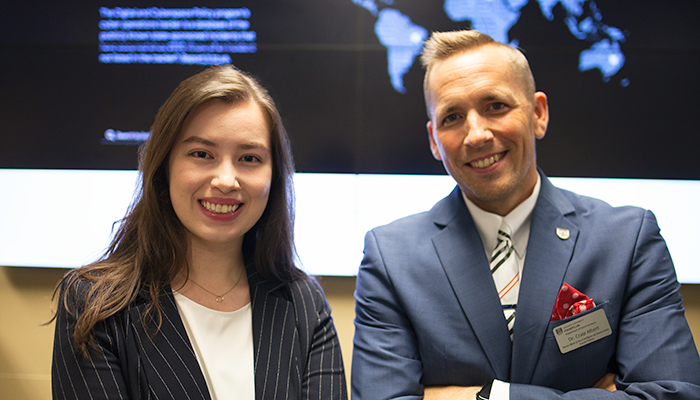 A student with her professor.