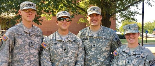 military students smiling for a photo