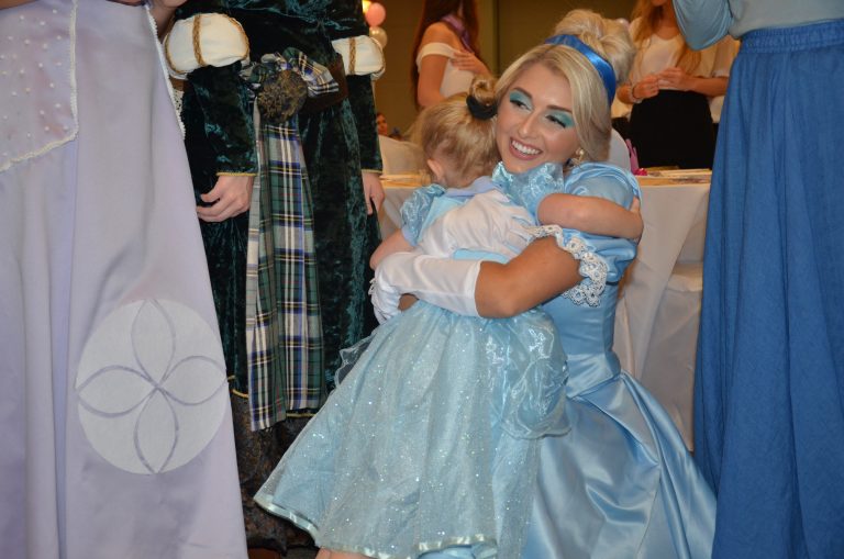 girl hugs Cinderella