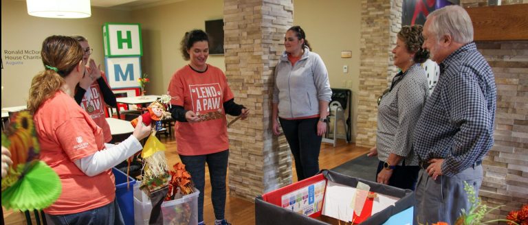 people standing up and talking