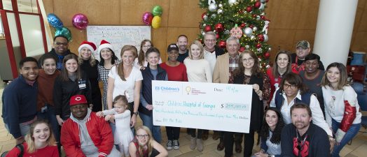 people with giant check