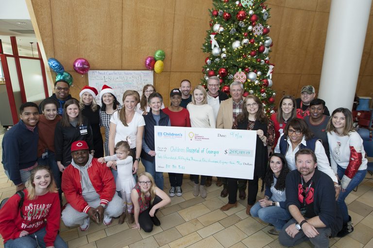 people with giant check